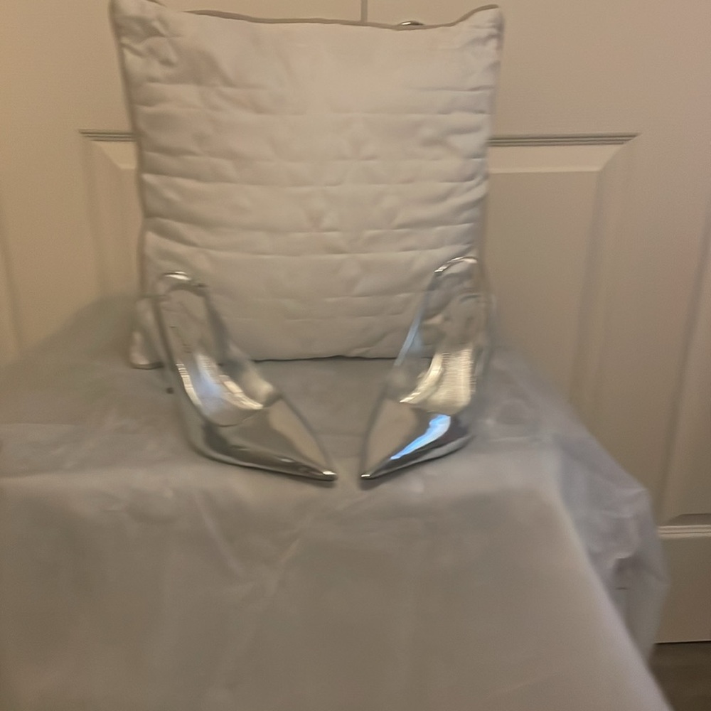 Ladies silver shoe back out and new